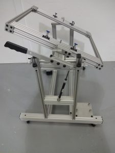 Extruded aluminum T-slot holding fixture for precision machining