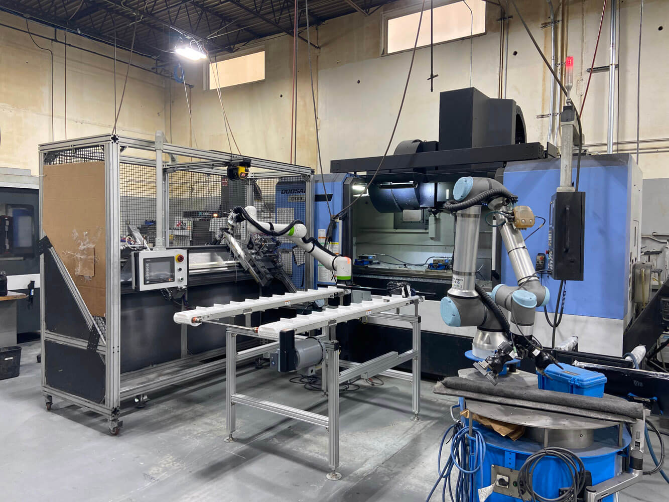 Extruded aluminum framing for robotic CNC machining station