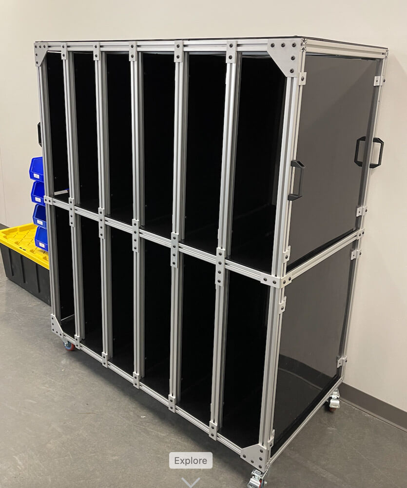 Modular extruded aluminum assembly line tracking cart with T-slot frame