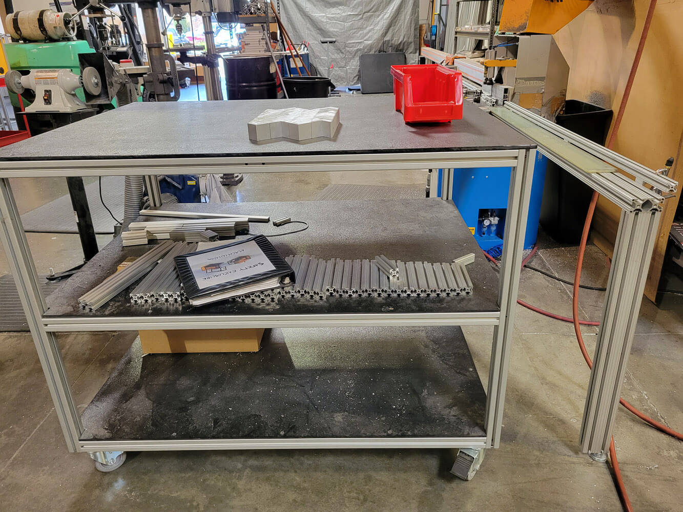 Extruded aluminum T-slot material handling cart for industrial use